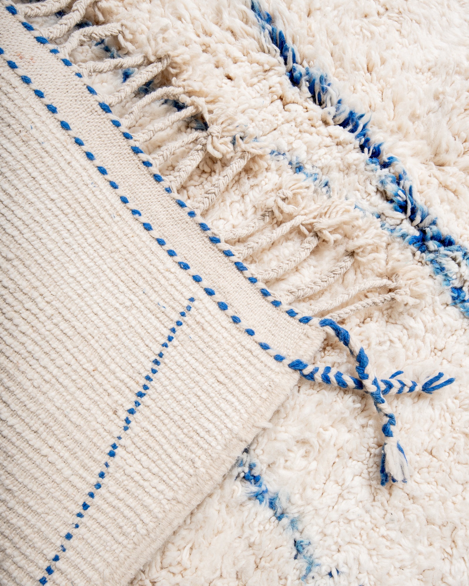 Modern, designer, handcrafted Berber rug from Morocco. Beniourain carpet with beautiful colours and patterns and fluffy wool texture.